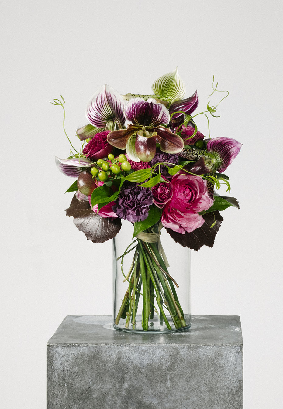 flower bouquet of orchid and ranunculus by flannel flowers