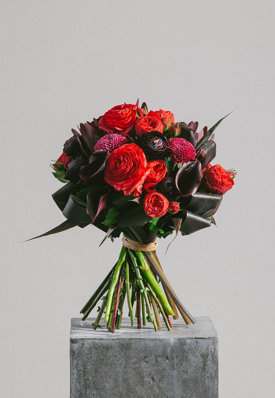flower bouquet of rose ranunculus and calla lily by flannel flowers