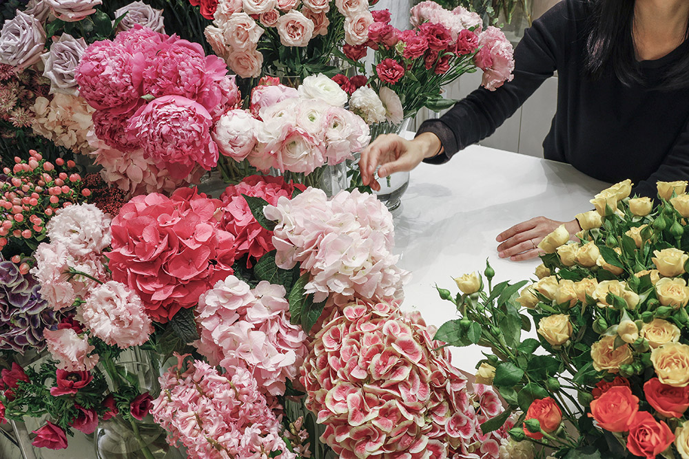 Florist arranging flowers at the flannel flowers store in Times Square, Causeway Bay, Hong Kong